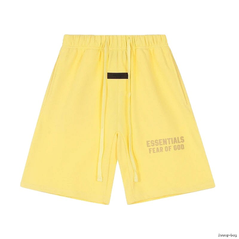 ESSENTIALS minimalist style yellow shorts