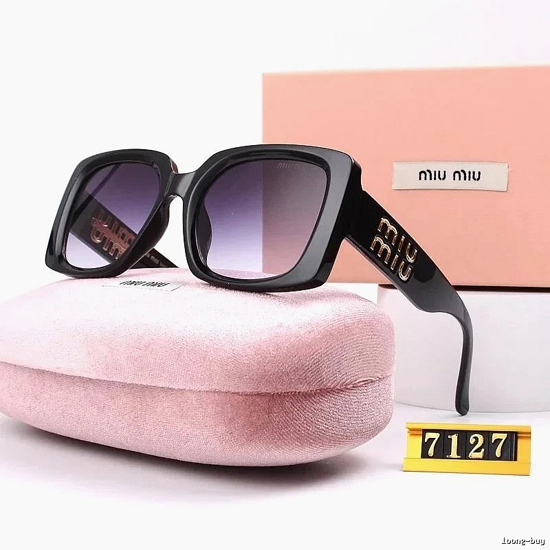 Miu Miu Compact Oversized sunglasses Black Oval Sunglasses for Smart Casual Looks