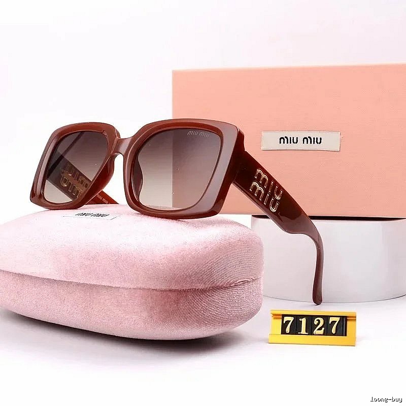 Miu Miu Summer Oversized sunglasses Black Oval Sunglasses with Bold Graphic