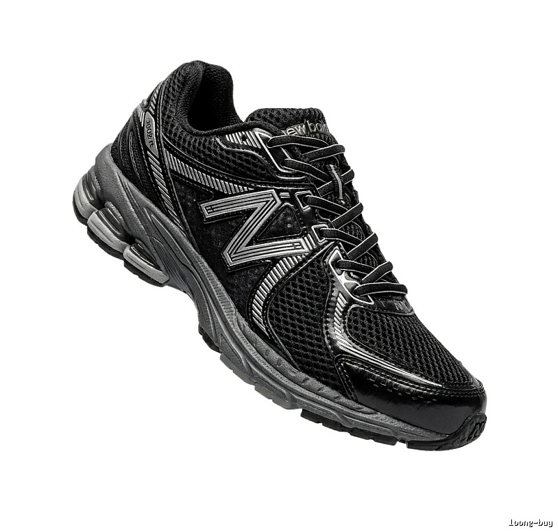 New Balance retro-style black and grey sports shoes