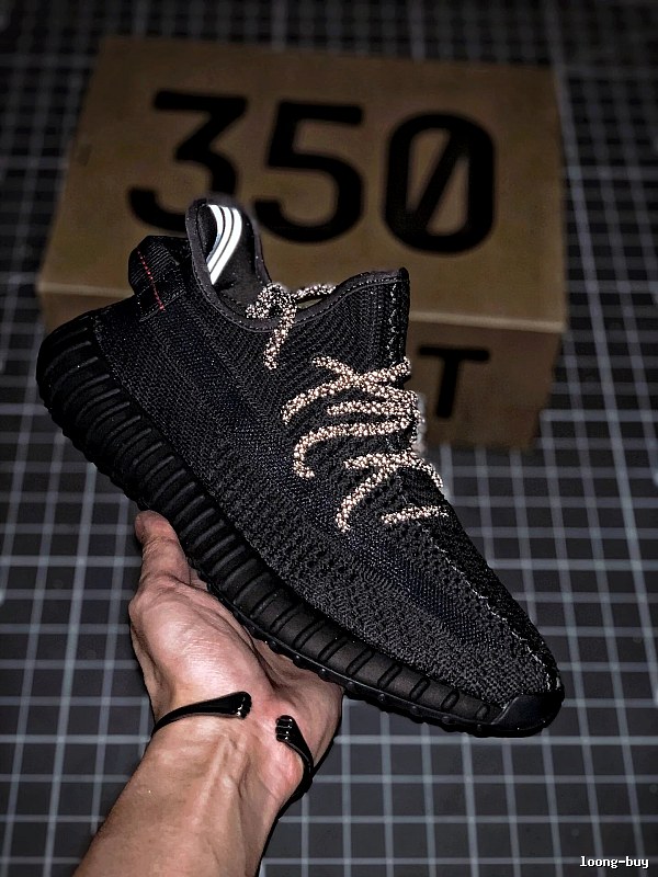 Yeezy Black Knit Sneakers Defined by Sock-Like Collar